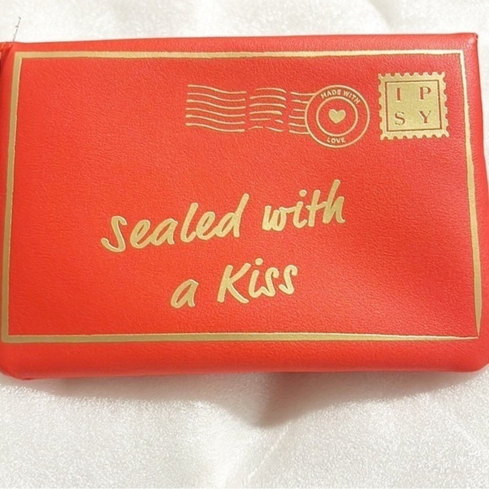 IPSy cosmetic red bag